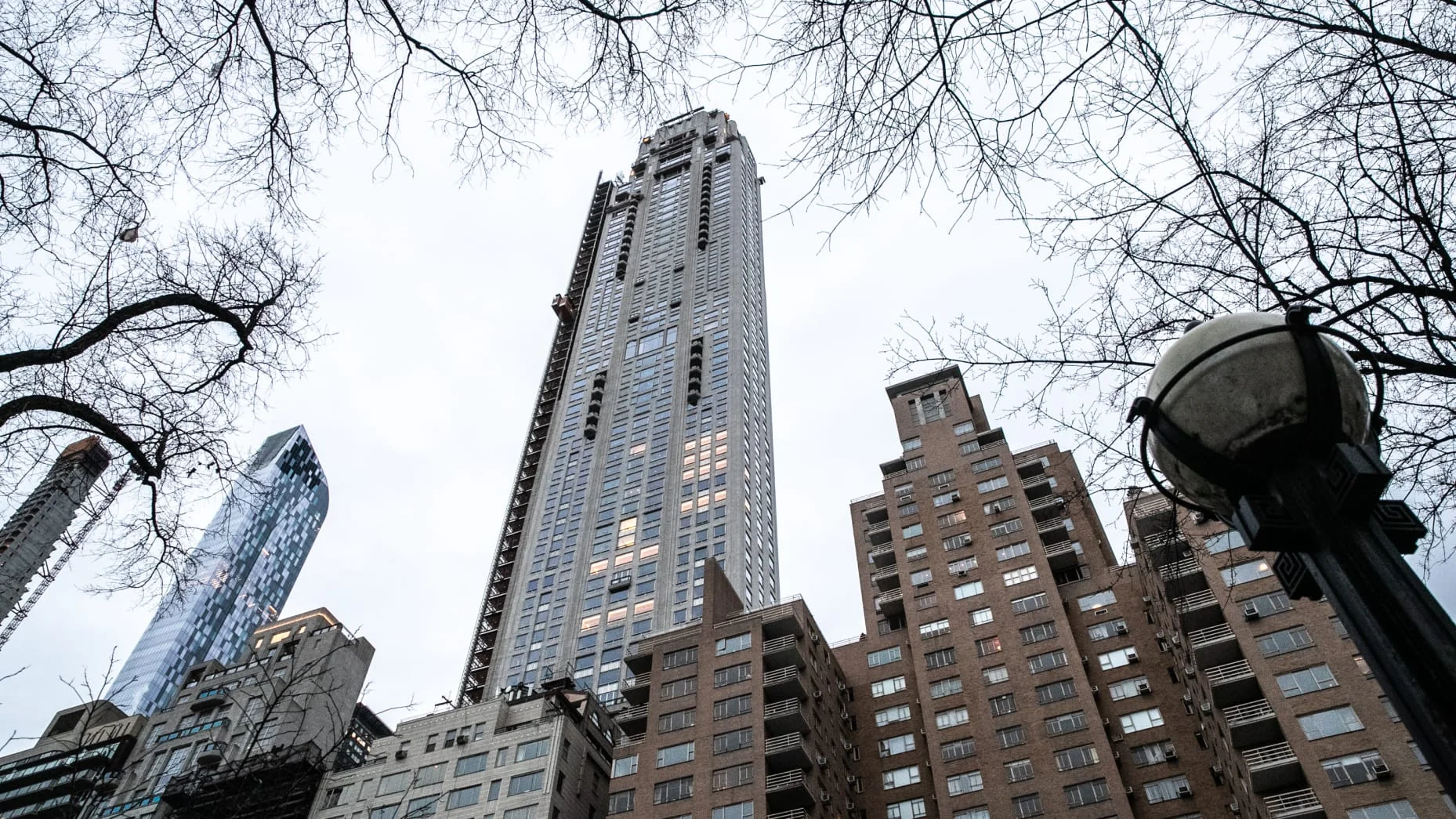 The 220 Central Park South building, center, stands in New York, U.S., on Wednesday, Jan. 23, 2019. Just days after buying one of the most expensive residential properties in London, Citadel founder Ken Griffin set a U.S. record with the $238 million penthouse at 220 Central Park South.